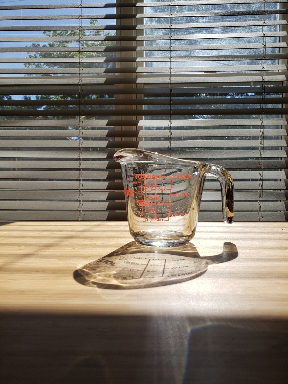 Clear Glass Measuring Cup with Red Measurement Markings